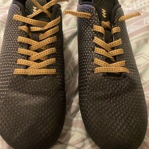 Stylish Black and Tan Kids Soccer Cleats